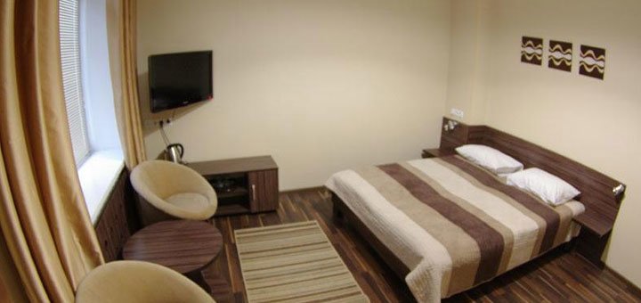 A room at the Darnitsky Hotel in Kyiv. Book a room with a discount. Cheap hotels in Kyiv.