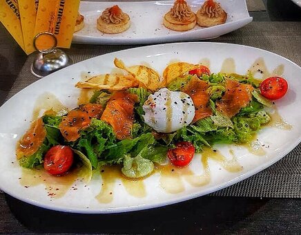 Promotion for salads in the parmesan restaurant in mariupol. book with a discount