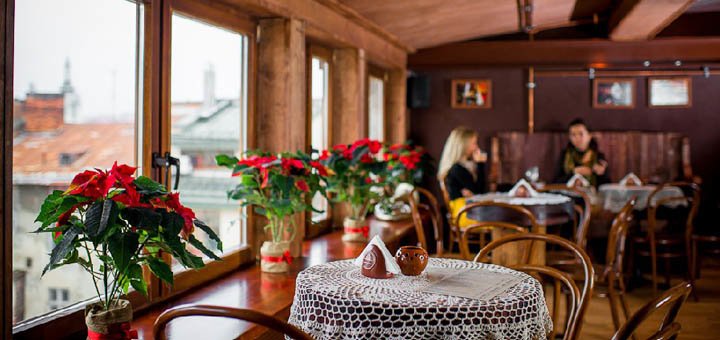 The interior of the cafe "Lviv Chocolate Workshop". Book a table at a discount