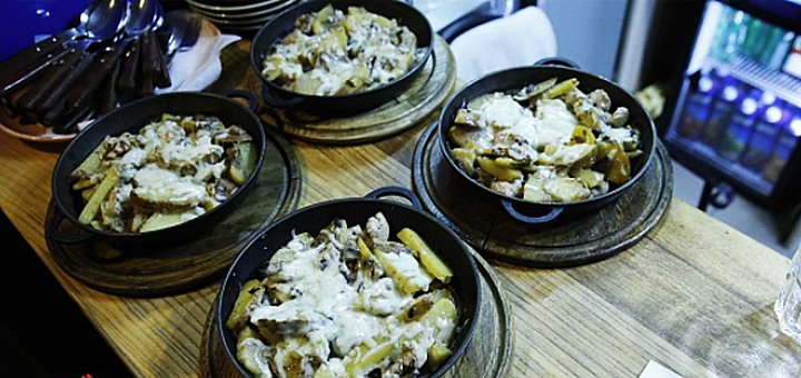 Tasty dishes at the Kogut hosper pub in Lviv